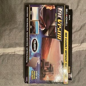 Tacvisor. Never used. For driving purposes